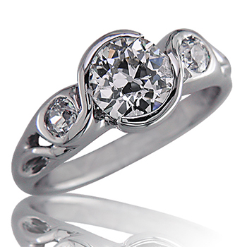 Style:ER418C ~ An elegant three stone diamond ring.