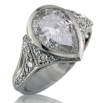 Style:LRM772 ~ Make a statement with this 4 carat pear shape diamond ring.
