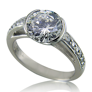 Style:LRR73 ~ A round brilliant cut diamond set with a semi bezel engagement ring.