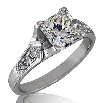 Style:LRS624C ~ A princess cut diamond engagement ring, prong set with three diamonds on each side.